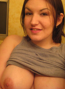 Slutty Kayla takes a picture of her huge tits for you Picture 10